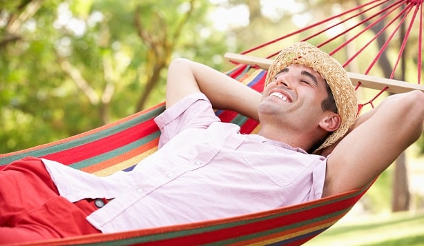 Man relaxing in a hammock